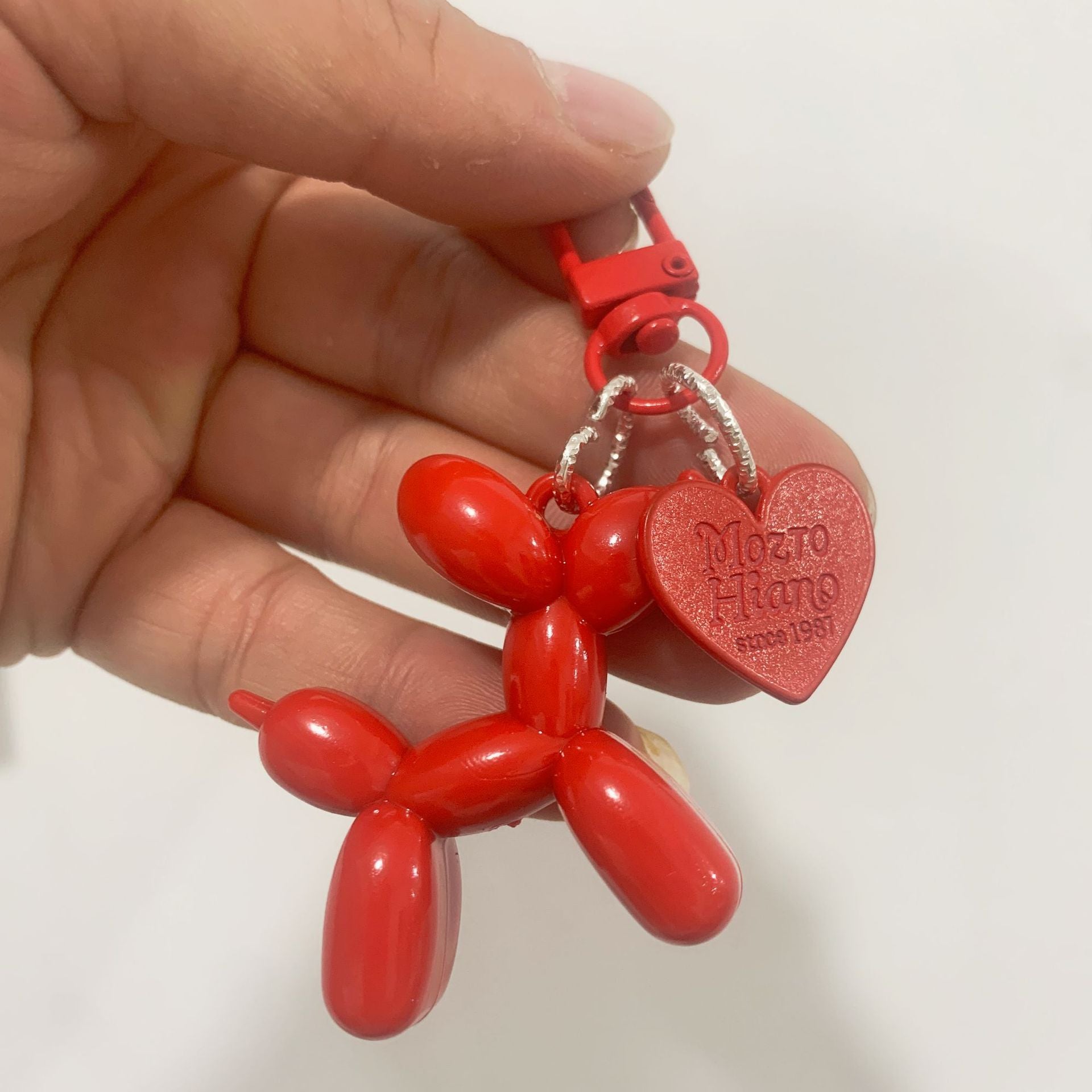 Dopamine rose red with black keychain pendant female Internet celebrity high-end niche handmade balloon dog bag pendant is versatile