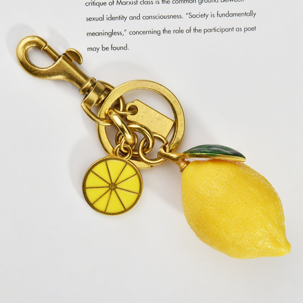 Cross-border new creative resin simulation fruit lemon car keychain bag pendant couple keychain gift