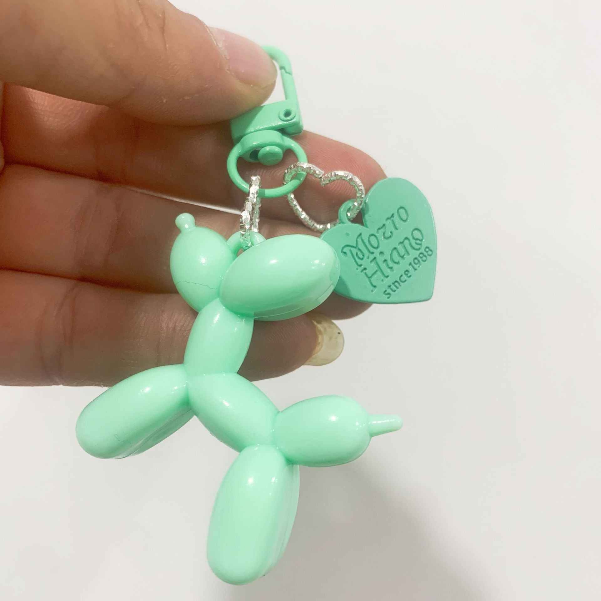 Dopamine rose red with black keychain pendant female Internet celebrity high-end niche handmade balloon dog bag pendant is versatile