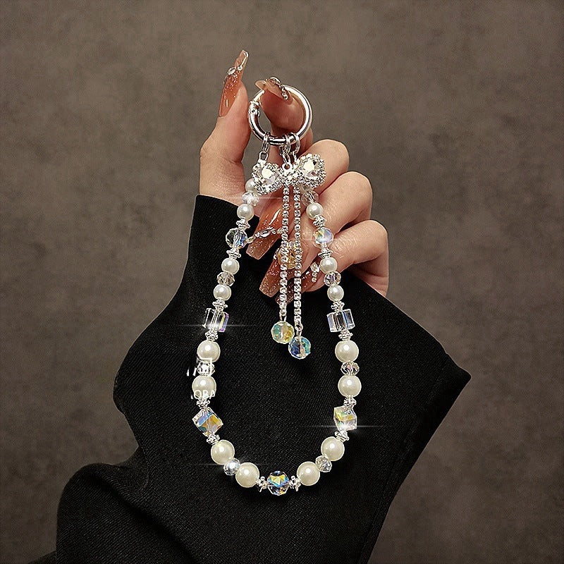 Luxurious high-end tassel bow crystal phone chain, lanyard, key bag, pendant, women's anti-handrail