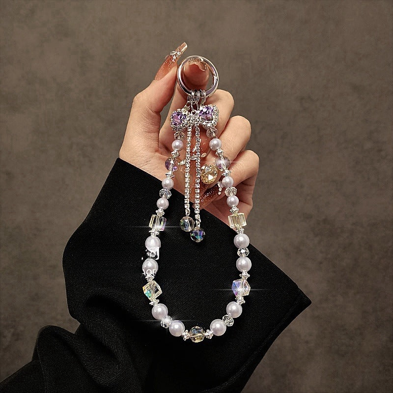 Luxurious high-end tassel bow crystal phone chain, lanyard, key bag, pendant, women's anti-handrail