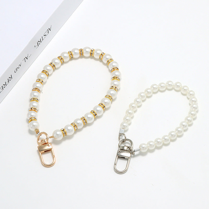 Pearl wrist chain small fragrance wind mobile phone lanyard pearl chain diamond inlaid short chain crossbody hanging chain mobile phone lanyard women's model