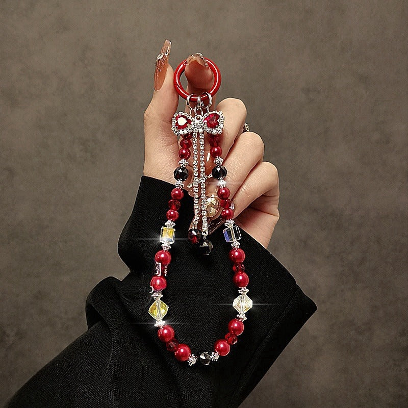 Luxurious high-end tassel bow crystal phone chain, lanyard, key bag, pendant, women's anti-handrail