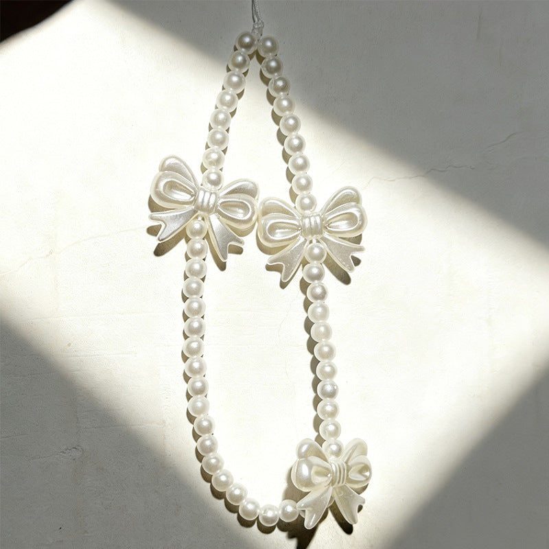 mobile phone chain wholesale Korean pearl star pendant short beaded chain phone case lanyard girl wrist ornament