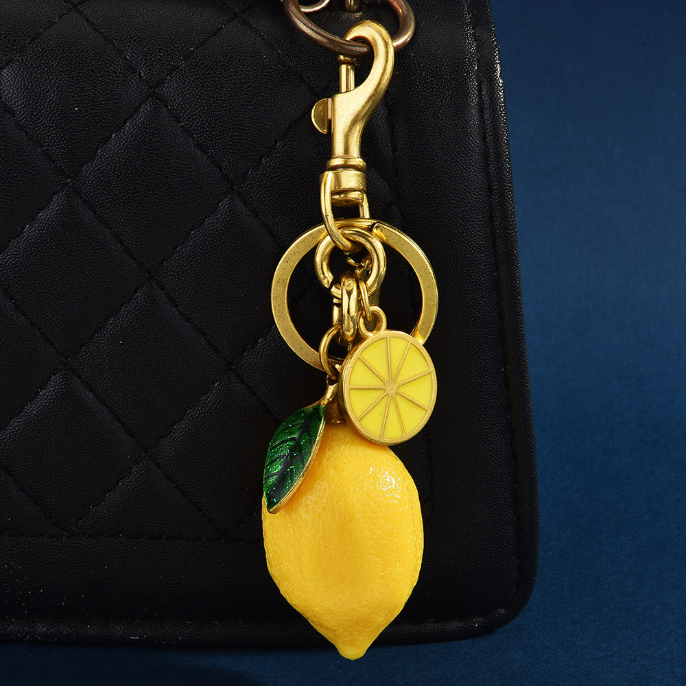 Cross-border new creative resin simulation fruit lemon car keychain bag pendant couple keychain gift