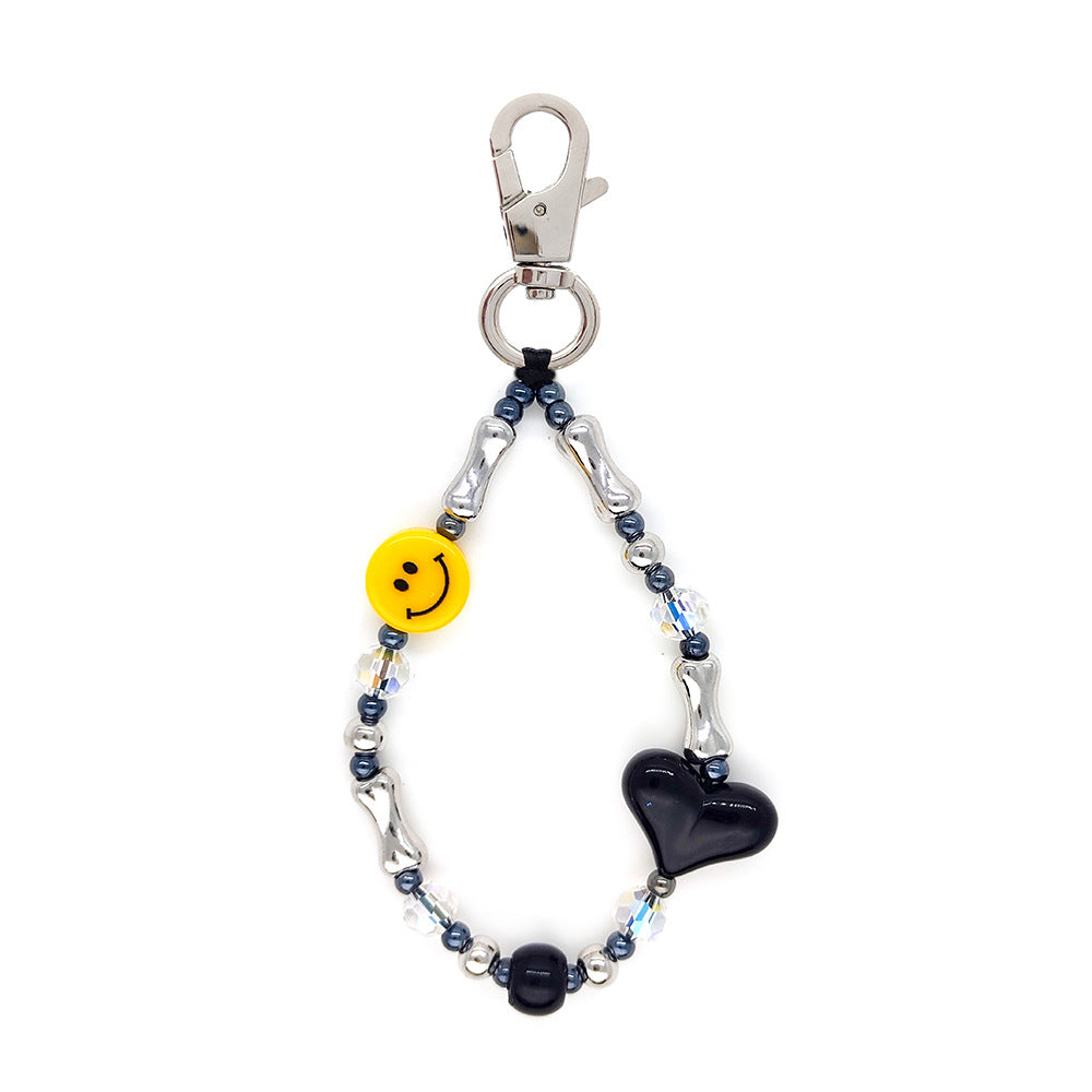 Women's bag keychain, wristband, keychain, versatile INS style acrylic heart white cloud bead phone chain