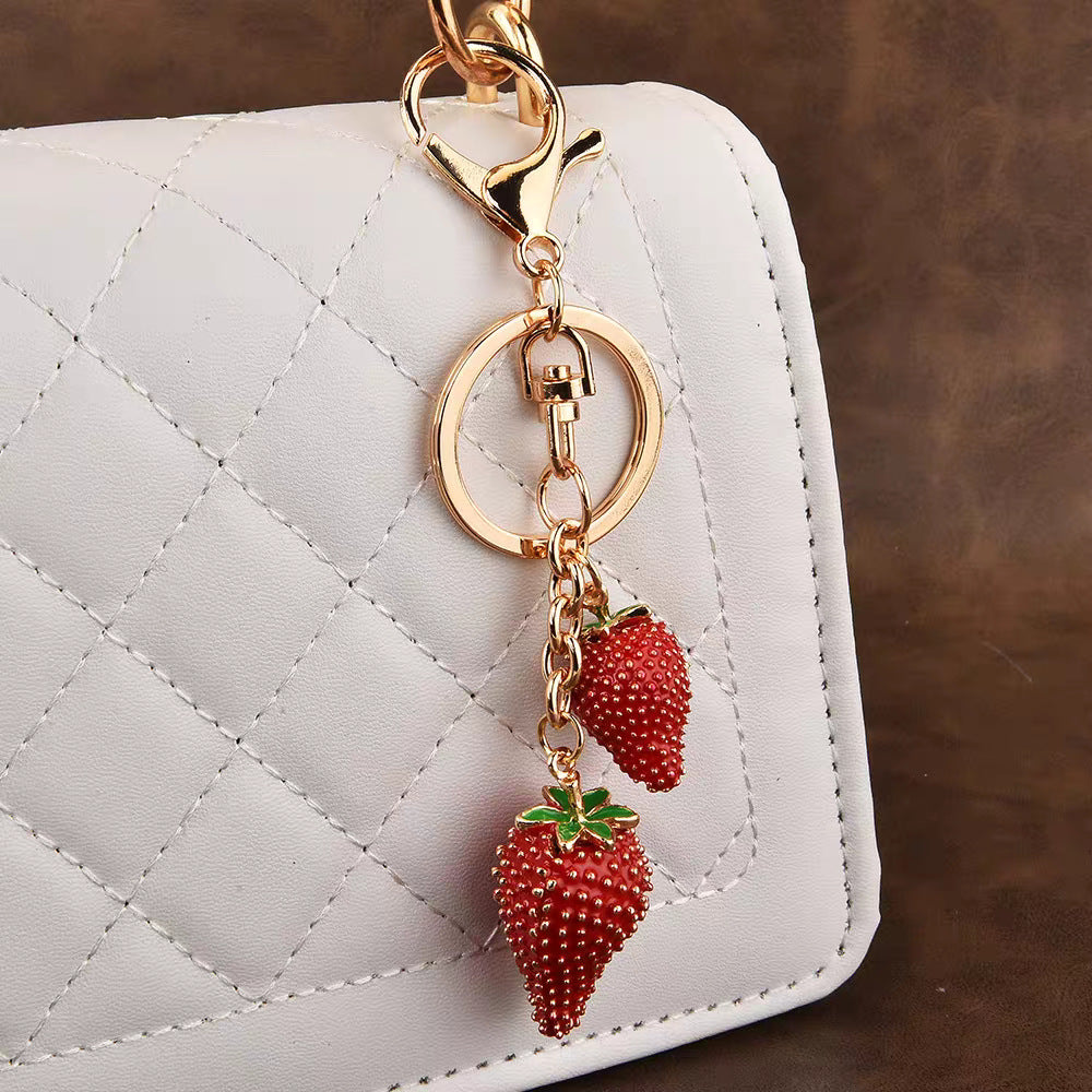 Cross-border hot sale dripping oil red small strawberry keychain light luxury pendant women's luggage accessories fashion high-end accessories