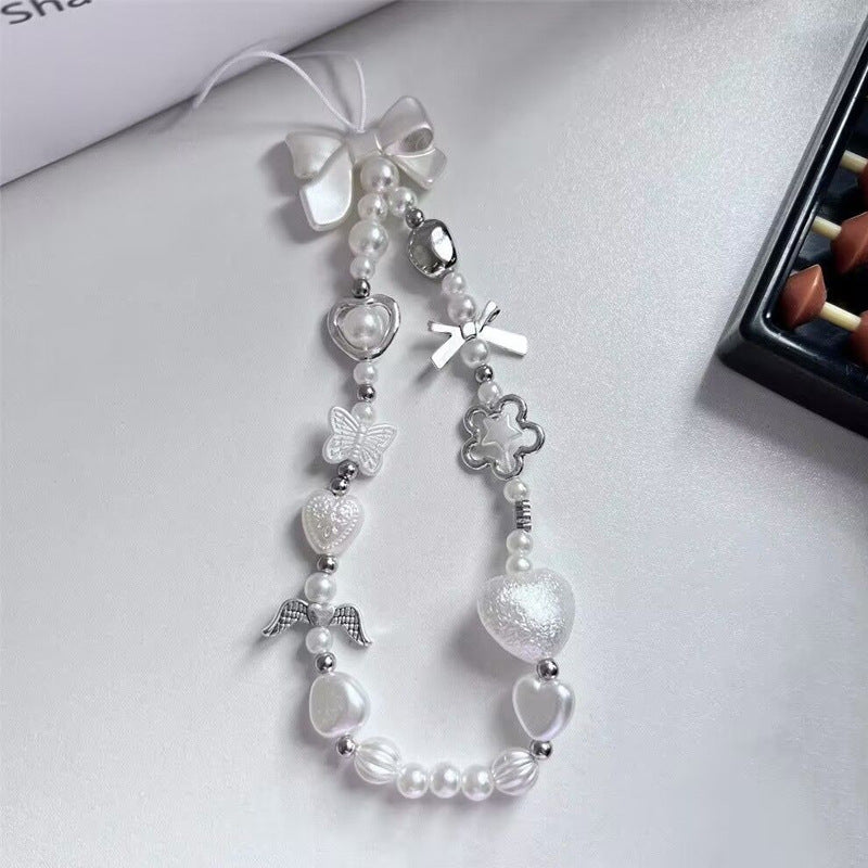 mobile phone chain wholesale Korean pearl star pendant short beaded chain phone case lanyard girl wrist ornament
