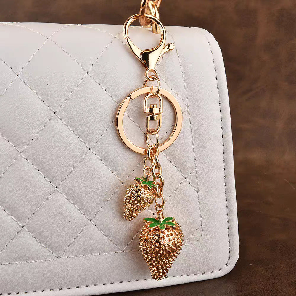 Cross-border hot sale dripping oil red small strawberry keychain light luxury pendant women's luggage accessories fashion high-end accessories