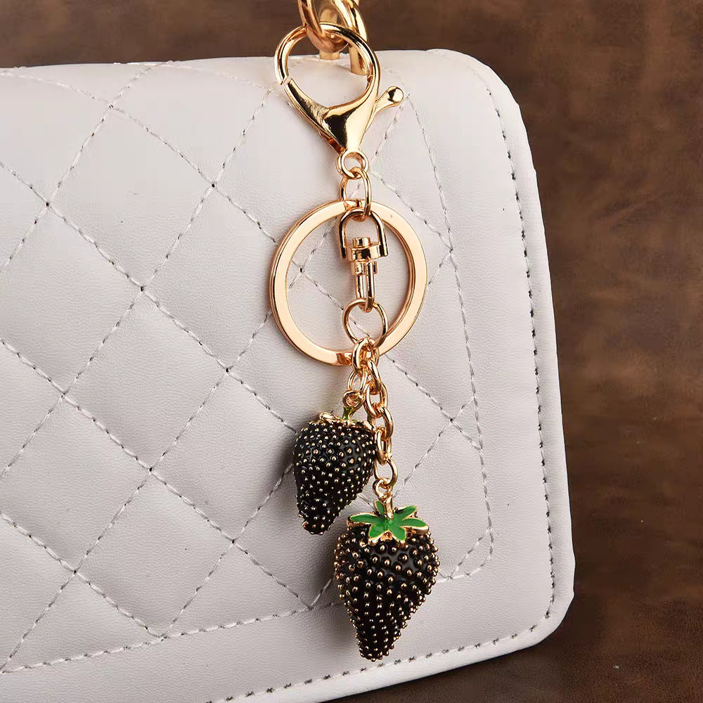 Cross-border hot sale dripping oil red small strawberry keychain light luxury pendant women's luggage accessories fashion high-end accessories