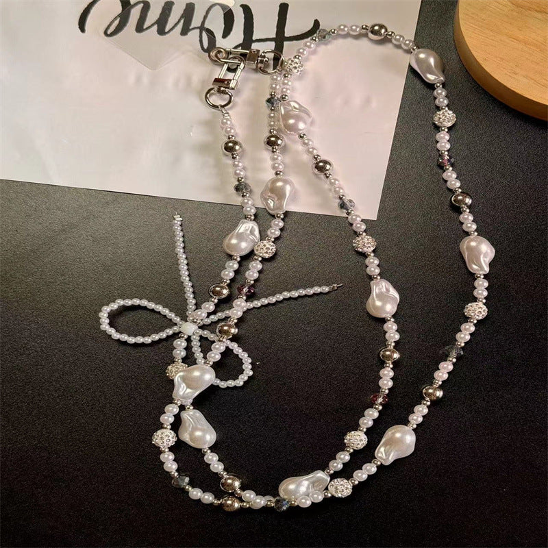 Silver pearl bow diamond ball phone chain, can be worn crossbody, can be worn around the neck, camera chain bag pendant for women