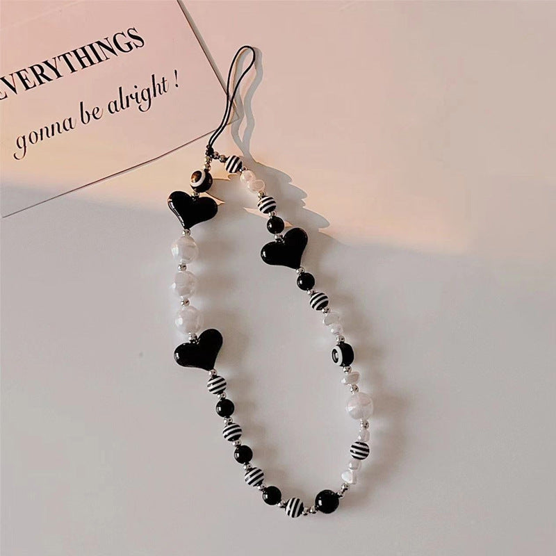 mobile phone chain wholesale Korean pearl star pendant short beaded chain phone case lanyard girl wrist ornament