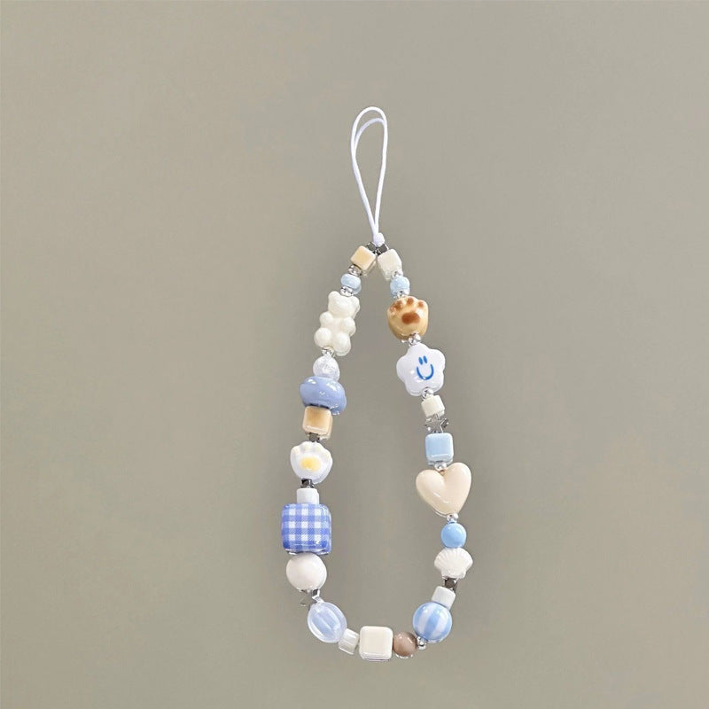 mobile phone chain wholesale Korean pearl star pendant short beaded chain phone case lanyard girl wrist ornament