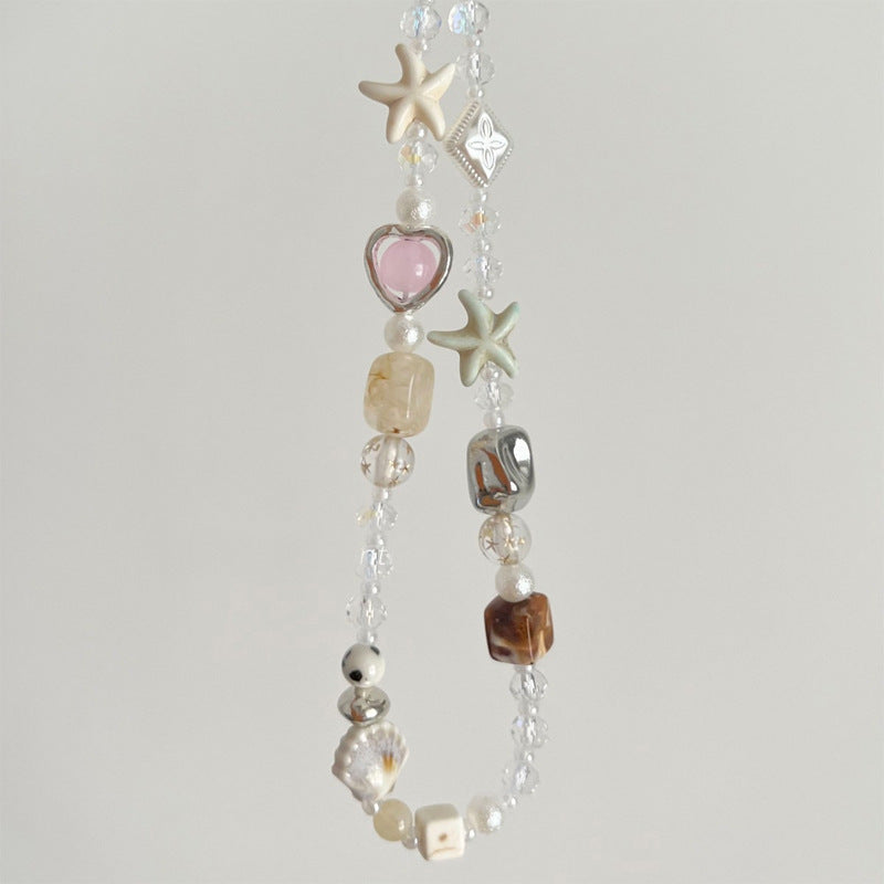 mobile phone chain wholesale Korean pearl star pendant short beaded chain phone case lanyard girl wrist ornament