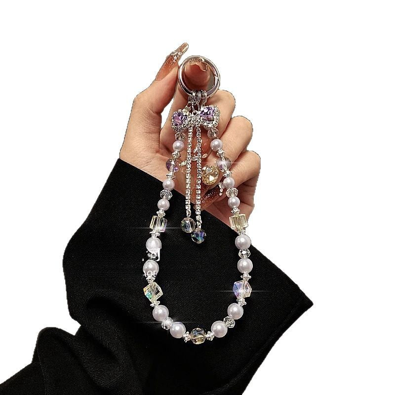 Luxurious high-end tassel bow crystal phone chain, lanyard, key bag, pendant, women's anti-handrail